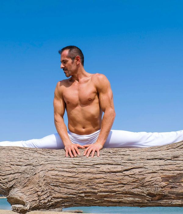 Man performing a strength exercise in a calm environment.